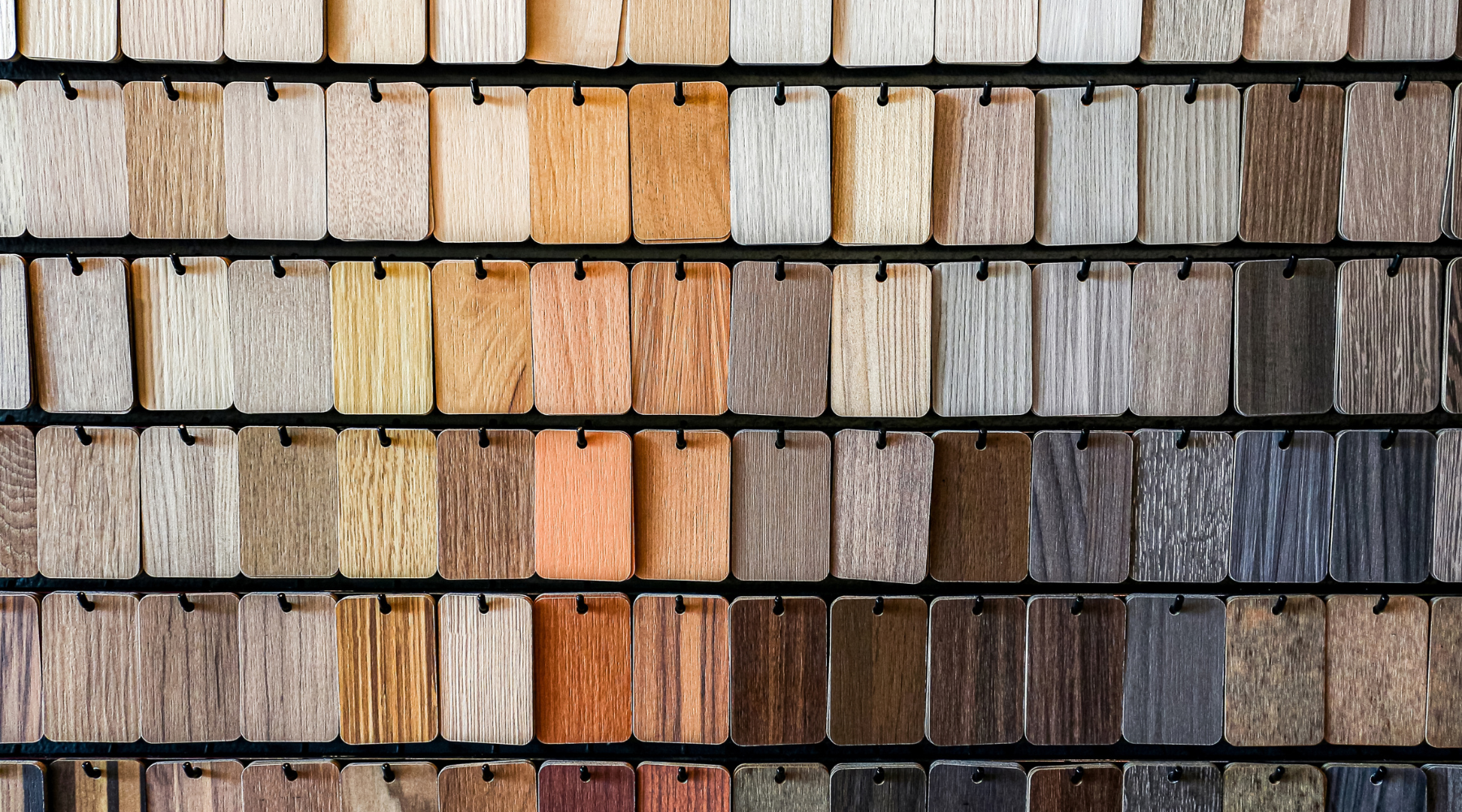 Different samples of finishing materials appeared on wood.